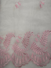 Pink embroidered lace trim with leaf patterns on a sheer palest pink mesh fabric.